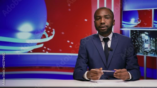 News presenter covering daily topics live on tv program, hosting entertainment and media segment in studio. African american journalist doing reportage of breaking news on global television network.