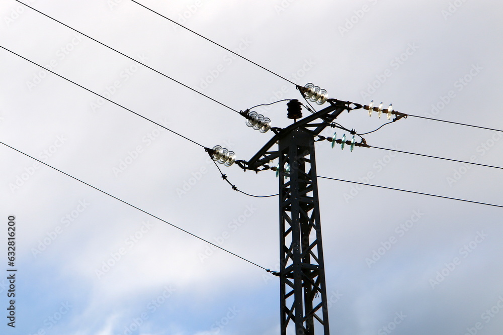 Power electric pole with line wires on insulators. Power electric pole with line wires on insulators.