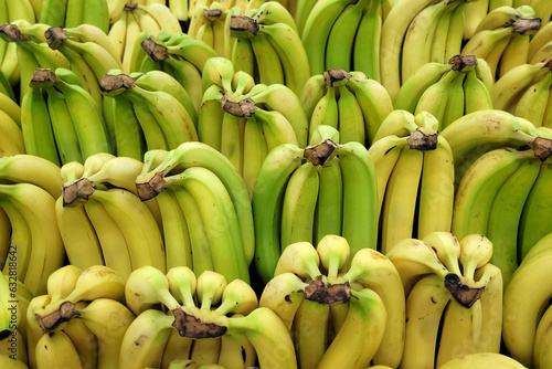 Full frame image bananas display on local market stall.