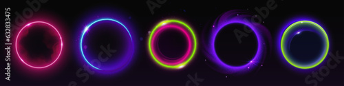 Colorful circular light flare effects isolated on dark black background. Vector realistic illustration of neon rings glowing, sparkling with shimmering particles and smoke, space halo, energy vortex