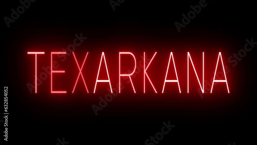 Red flickering and blinking animated neon sign for the city of Texarkana photo