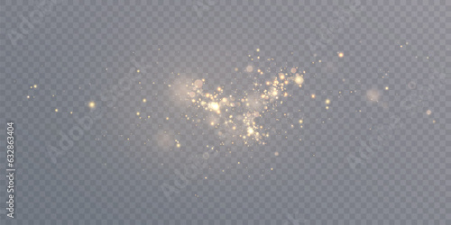 The light of gold dust. Bokeh light lights effect background. Christmas glowing background dust glows with bokeh light