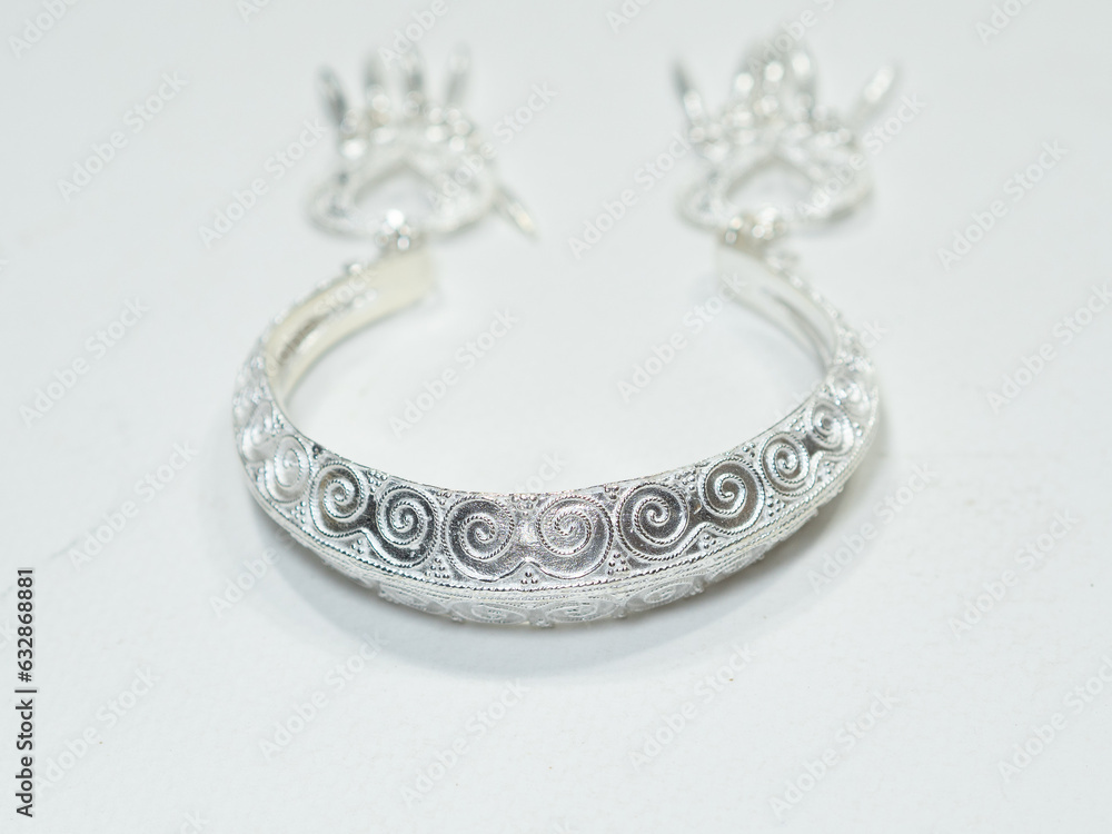 Silver jewelry and gemstone on white background Silver jewelry and gemstone on white background