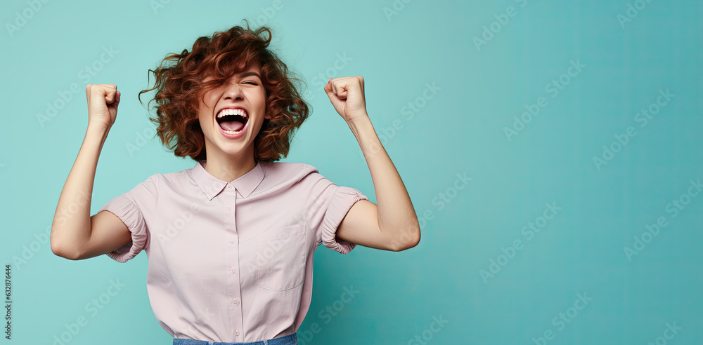 Woman raised both of her fists while screaming. Success concept.