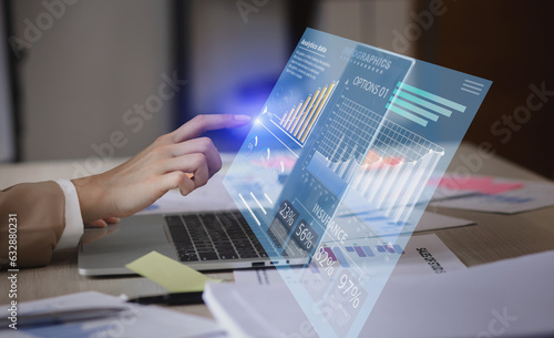 Business hand touching on laptop computer with big data technology and data interface science, Business analysing and artificial intelligence concept. 