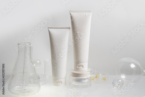 makeup cosmetic medical skin care, a mockup for cream lotion bottle product, packaging on white waterdrop fresh with glass background