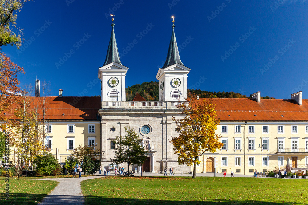 European building with two clock towers and spires