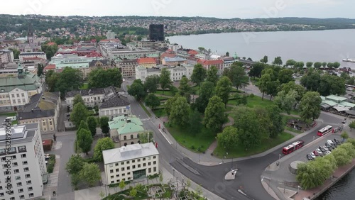 City park and old government office building in Jonkoping city centre, Sweden. Drone flyover photo