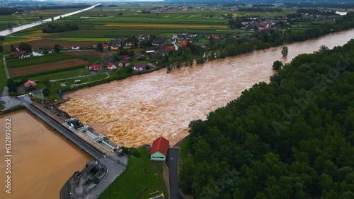 Horrific Aerial 4K Drone footage of  HE Markovci pri Ptuju.Etensive floods posed operational challenges. Footage was captured during the day in cloudy weather. photo