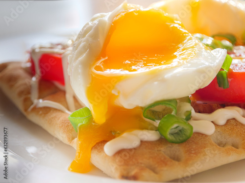 Bread with cutted boiled egg, sliced red tomatoes and fresh green onion.