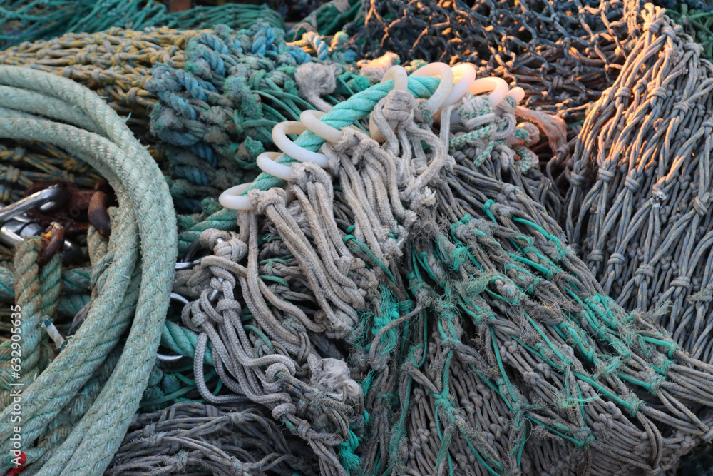 fishing nets under the coast piled ashore-