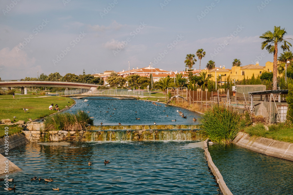 Fototapeta premium Great view of Channel and little bridge full of ducks Ballena Spain
