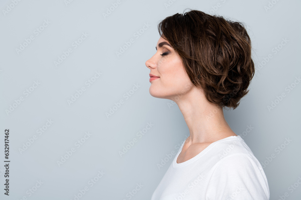 Side profile photo of adorable woman with bob hairstyle dressed white t-shirt eyes closed enjoy moment isolated on gray color background Side profile photo of adorable woman with bob hairstyle dressed white t-shirt eyes closed enjoy moment isolated on gray color background