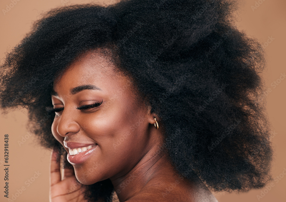 Beauty, face and hair with a model black woman in studio on a brown background for natural cosmetics. Smile, makeup and haircare with a happy young afro female person indoor for shampoo treatment Beauty, face and hair with a model black woman in studio on a brown background for natural cosmetics. Smile, makeup and haircare with a happy young afro female person indoor for shampoo treatment