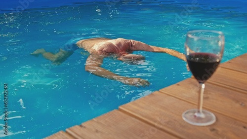 Dead Body Adult Caucasian Male Drown in Swimming Pool after Cardiac Arrest