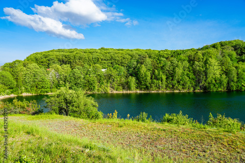 Fototapeta Naklejka Na Ścianę i Meble -  Jezioro Turkusowe near Wapnica. Lake in Wolin National Park in Poland. Idyllic landscape with green nature by the lake. Turquoise lake. 
