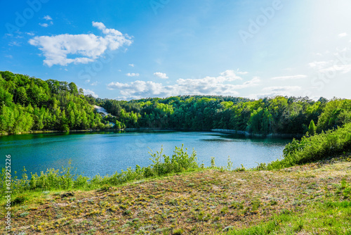 Fototapeta Naklejka Na Ścianę i Meble -  Jezioro Turkusowe near Wapnica. Lake in Wolin National Park in Poland. Idyllic landscape with green nature by the lake. Turquoise lake. 
