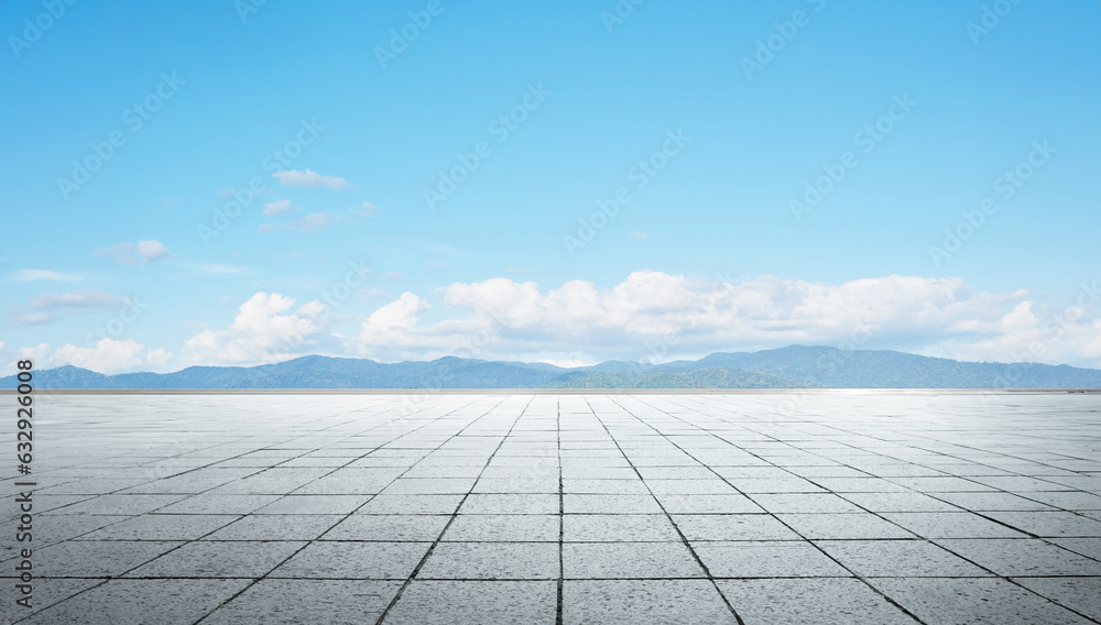Empty floor in front of blue sky . Empty floor in front of blue sky .