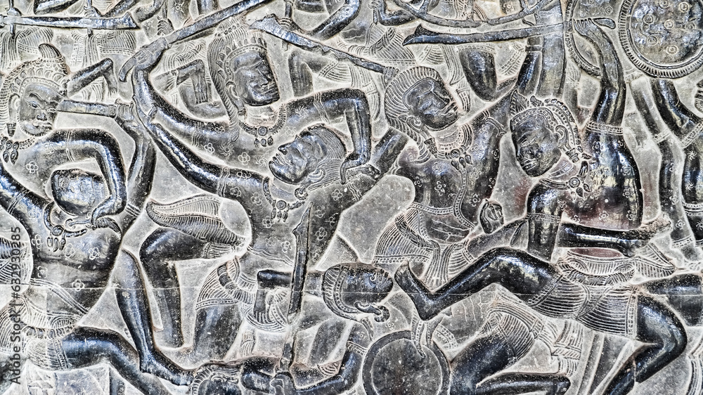 Wall carving of Khmer Culture in Ancient ruins Angkor Wat temple - famous Cambodian landmark. Siem Reap, Cambodia.
