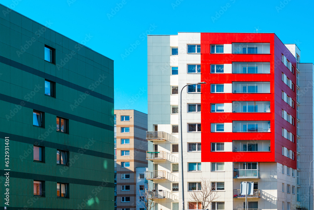 residential block of flats.Newly finished modern style apartment building in freshly renovated residential area.A newly built building in nice bright colors with apartments for sale.