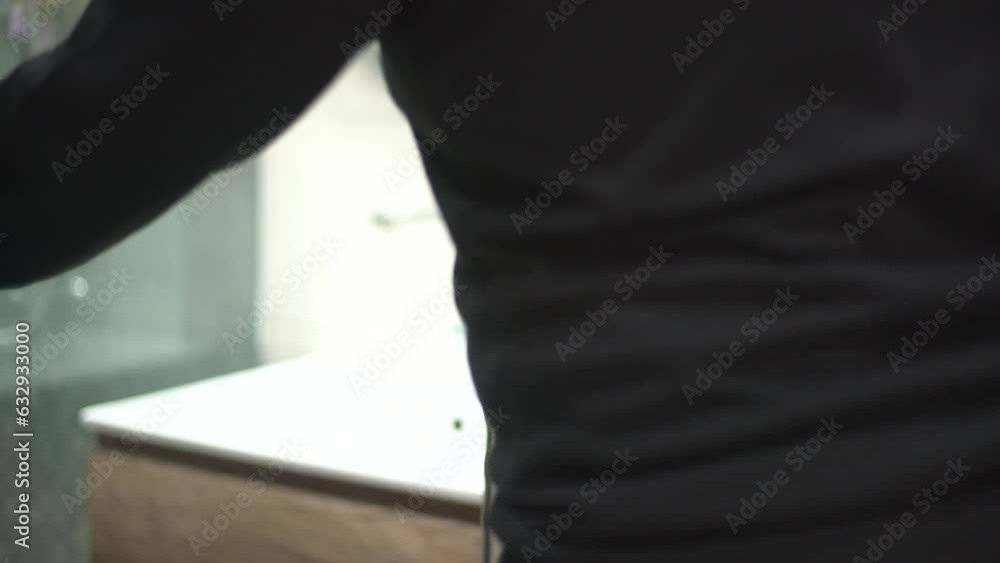 a person who opens and closes the door a person who opens and closes the door
