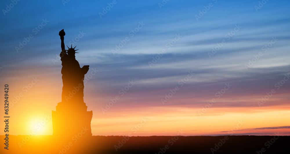 Statue of Liberty on background of sunset sky. Greeting card for Independence Day. USA celebration.