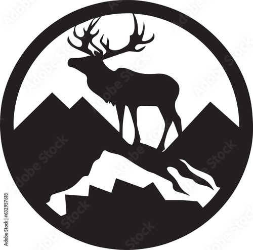 Composition of a circle an with elk staying on the top of the mountain silhouette