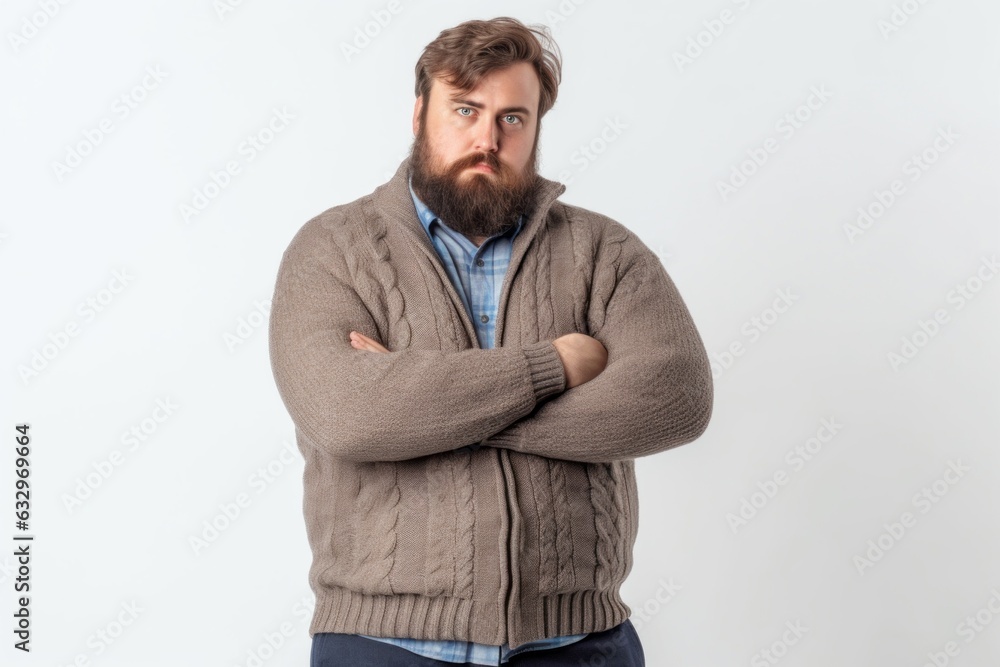 Lifestyle portrait photography of a man in his 20s expressing concern about his weight due to obesity wearing a chic cardigan against a white background Lifestyle portrait photography of a man in his 20s expressing concern about his weight due to obesity wearing a chic cardigan against a white background
