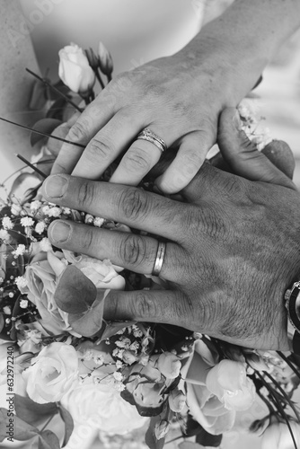 bride and groom holding hands