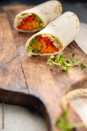 tortilla vegetable burrito fajita shawarma with vegetables pita healthy meal food snack on the table copy space food background rustic top view