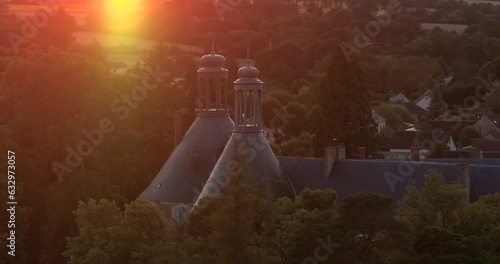 From the height of the drone filmed a medieval castle located in the center of France. The historic castle Saint Fargeau is a historical heritage of Burgundy. Landmark of France preserved to this day photo