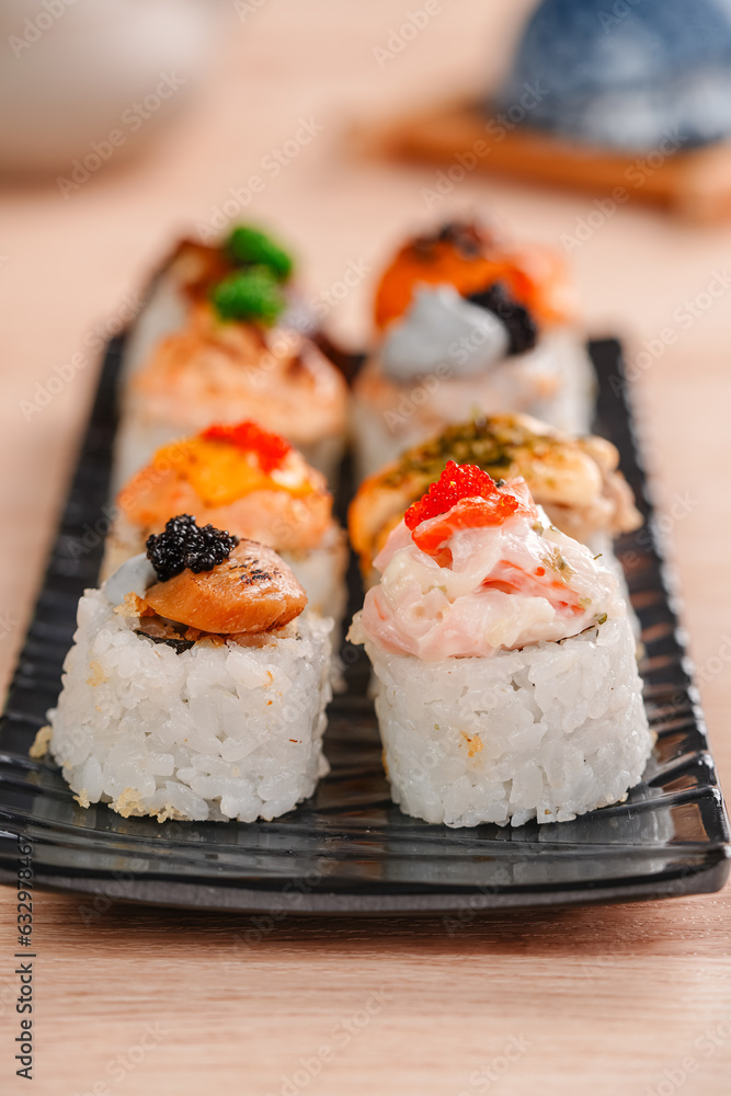sushi is a Japanese dish of prepared vinegared rice, usually with some sugar and salt, accompanied by a variety of ingredients such as seafood, often raw and vegetables. sushi is a Japanese dish of prepared vinegared rice, usually with some sugar and salt, accompanied by a variety of ingredients such as seafood, often raw and vegetables.