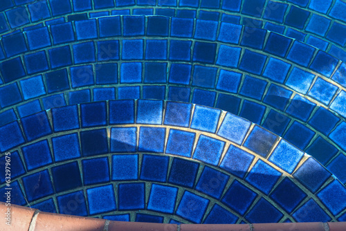 blue glass mosaic swimming pool steps