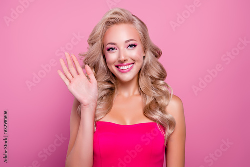 Portrait of pretty girly lady wave hand recording video for barbie fans over pink color background