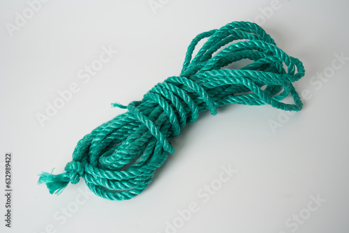 green plastic rope on white background