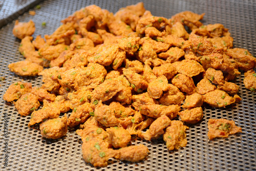 fried fish-paste balls at street food market in Bangkok, Thailand