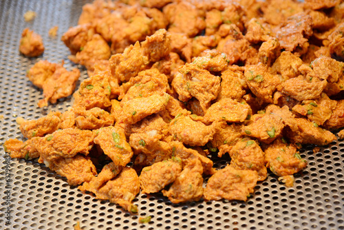 fried fish-paste balls at street food market in Bangkok, Thailand