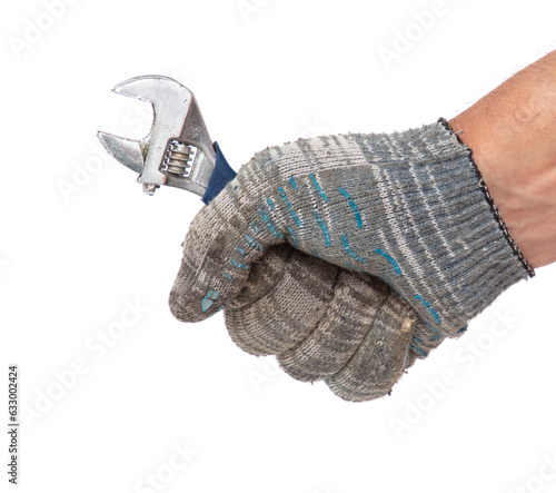 Hands in work gloves holding a wrench, isolated on white background
