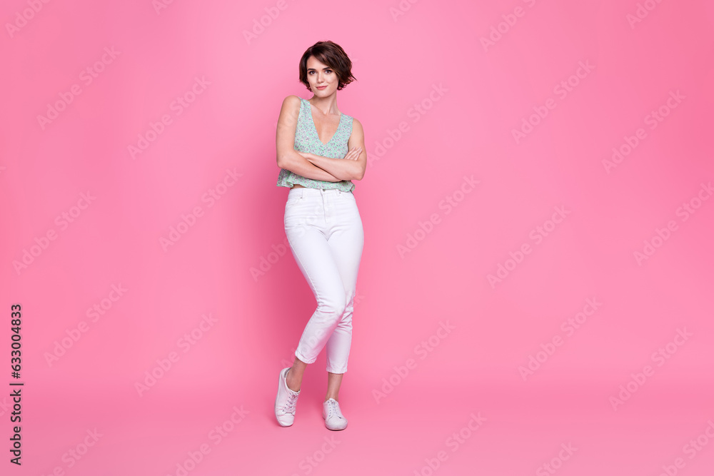Full body size photo of young confident influencer woman bob brown hairstyle crossed hands model charming isolated on pink color background Full body size photo of young confident influencer woman bob brown hairstyle crossed hands model charming isolated on pink color background