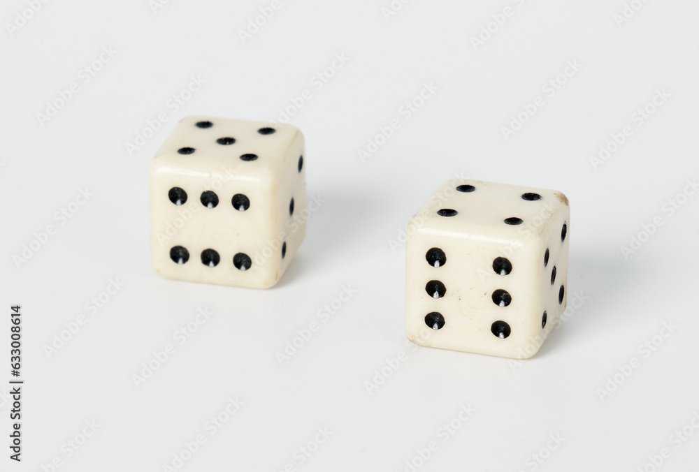Two white dice on a white isolated background Two white dice on a white isolated background