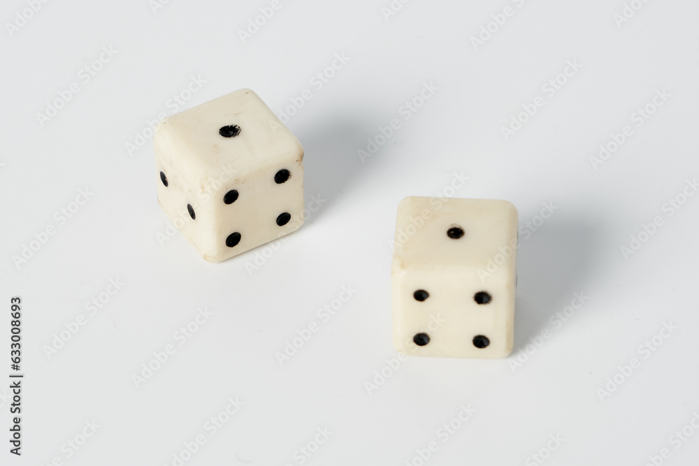 Two white dice on a white isolated background Two white dice on a white isolated background