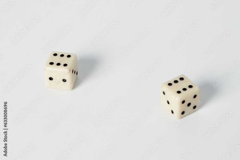Two white dice on a white isolated background Two white dice on a white isolated background