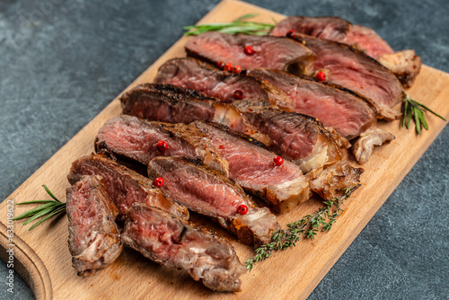 Grilled beef steak with spices. place for text, top view