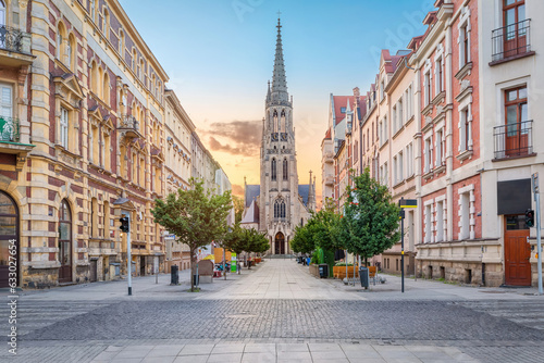 Katowice, Poland - view of Mariacka pedestrian street and Virgin Mary church on sunrise photo