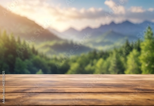 The empty wooden table top with blur background of mountain forest