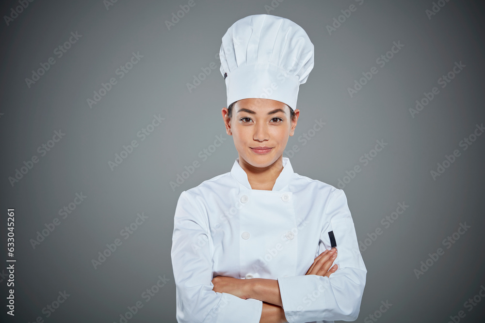 Portrait of young chef with her arms crossed. Portrait of young chef with her arms crossed.