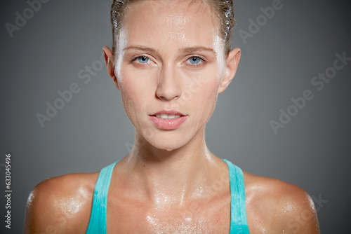 Portrait of sweating young woman.