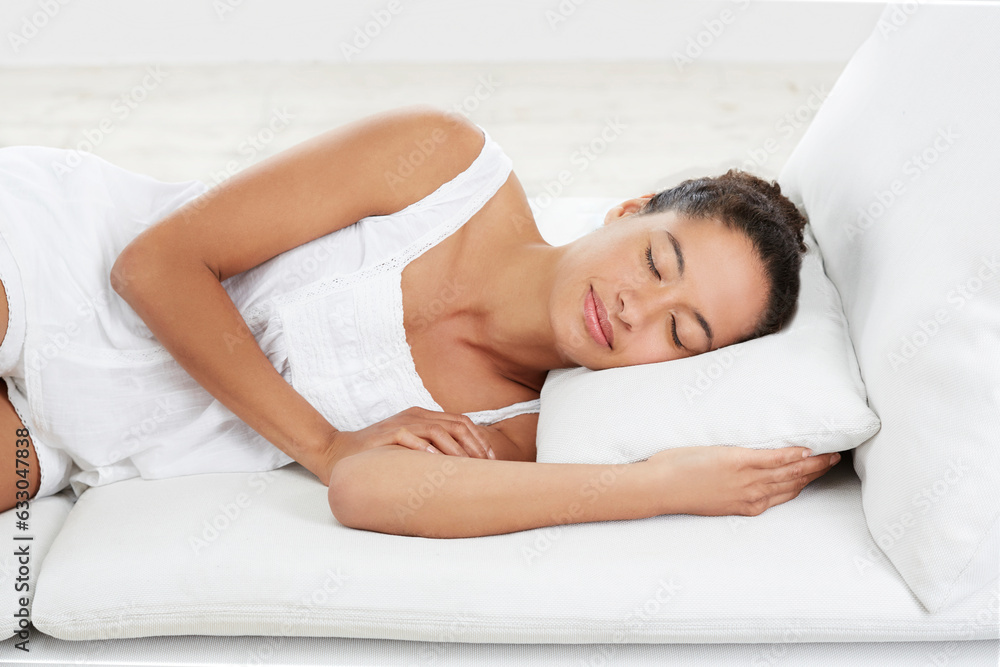 Woman lying down on pillow, asleep. Woman lying down on pillow, asleep.