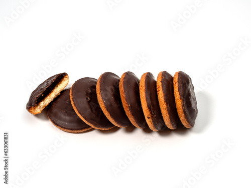 Cookies with dark chocolate and orange filling. Cookies with dark chocolate on a white background