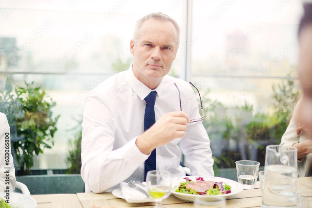 Businessman holding glasses at restaurant Businessman holding glasses at restaurant